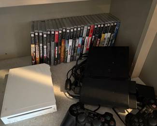Gaming consoles:  Sony PS2 Slim console, Wii and PS2 games