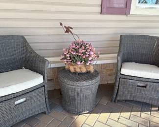 All-season wicker armchairs with pull-out ottoman and side table