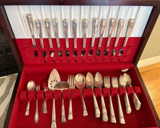 Silver-plated flatware in storage box