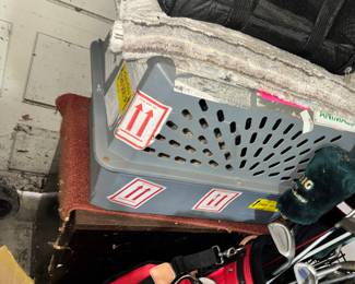 golf clubs and dog cages