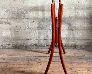 This lot features a Victorian bent wood towel rail that measures, 34” H x 25.5” W x 12” D.
