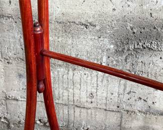 This lot features a Victorian bent wood towel rail that measures, 34” H x 25.5” W x 12” D.
