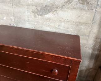 This lot features a 19th century American Empire mahogany chest of drawers that measures, 38” H x 46” W x 20” D.
