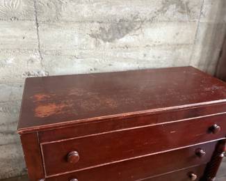 This lot features a 19th century American Empire mahogany chest of drawers that measures, 38” H x 46” W x 20” D.
