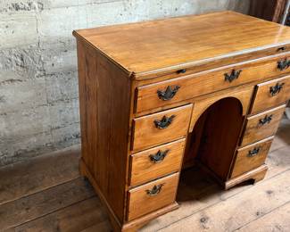 This lot features a rare 18th century Georgian style kneehole desk that measures, 33.5” H x 36.5” W x 20.5” D.
