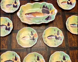Hand painted Limoges porcelain fish platter from France 19th early 20th century. Scalloped edges gilt trim with gold leaf detailing.
Artist signed Rosine.