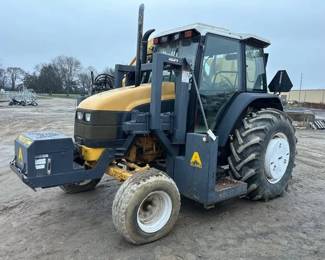 NEW HOLLAND TS100 TRACTOR WITH BOOM MOWER