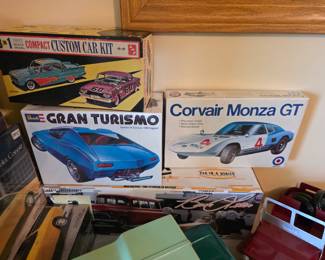 Entex 9117 1/25 Scale 1964 Chevy Corvair Monza GT Plastic Model Kit.
Revell Gran Turismo model car kit.
vintage SMP 1960 Plymouth Valiant 3 in 1 Custom Car Model Kit. 