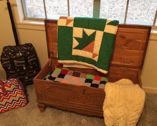 2 vintage quilts in cedar chest