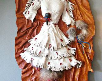 Native American Handcrafted Doll Mounted on a Large, irregularly shaped piece of Tanned Hide