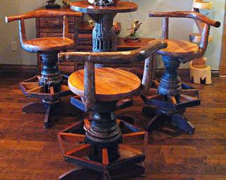 Rustic Ox Yoke & Wagon Wheel Pub Table with Matching Swivel Stools.