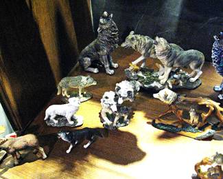 Collection of wolf figurines, likely from a Series such as "Protectors Of The Pack" or "Prophets of the Pack".