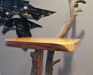 Display Stand Crafted from a Natural, Unfinished Tree Trunk and Branches Irregular-Shaped Wooden Shelves