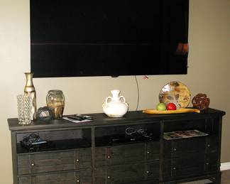 Haverty Entertainment Console with a rustic cappuccino finish, aged pewter hardware