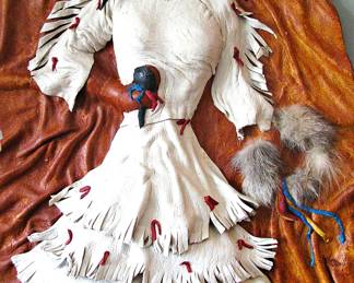 Native American Handcrafted Doll Mounted on a Large, irregularly shaped piece of Tanned Hide