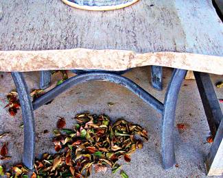 Pair of Live Edge Stone Accent Table with a Dark Metal Base. 