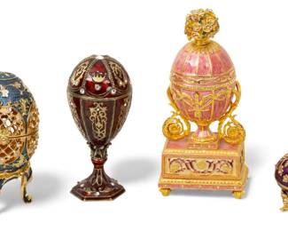 Lot 4012
Collection of Four Faberge Style Enamel, Crystal and Gilt Metal Eggs, Late 20th C., 4 PCS