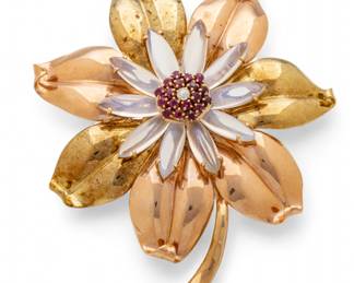 Lot 64
Large 14Kt Gold, Ruby and Moonstone Flower Brooch 1960, 'Opalescent', H 3.3" W 3" 44.9 g 1 PC