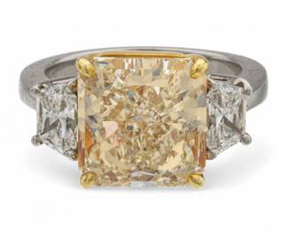 Lot 15
7.08 Carat Light Yellow Square Radiant Cut Diamond, Platinum and 18k Yellow Gold Ring, GIA Report Size 6