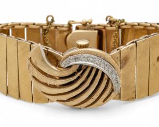 Lot 54
Geneve 14K Yellow Gold Bracelet Watch, Accent Diamonds, Concealed Dial 1960, W 6.5" 39 g 1 PC