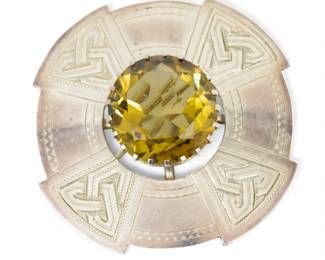 Lot 100
Thomas Ebbutt, Sterling Silver and Citrine Circle Brooch 1945, Dia. 2" 22.5 g 1 PC