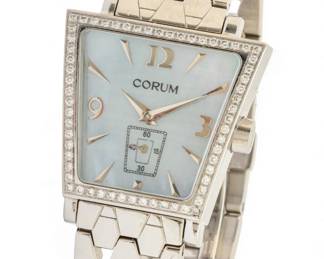 Lot 32
Corum (Swiss) Lady's Diamond, Mother of Pearl and Stainless Steel Wrist Watch SN: 684462, L 5.5" 73 g