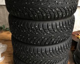 Four Nokian Hakkapeliitta Studded Tires, Size 275/40 R20 & Voxx Rims