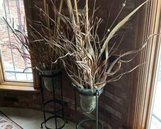 Floral sprigs with glass and iron stands