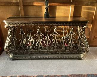 Large ornate iron console table.