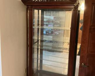 Large sliding glass door cabinet.