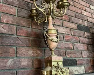 A pair of brass candle holders 1 of 3 pieces.