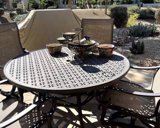 Patio table and chairs, grill, pottery