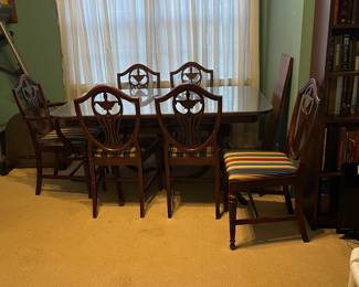 Ducan Fyffe Style Footed  table with 5 chairs & a captains Chair.....Glass Covers top of Table ----Approximately 40' 50's era