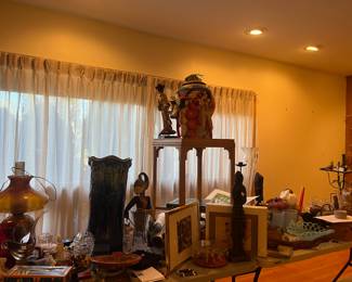 Lamps, umbrella stand, majolica, stone carvings, Intuit, candelabras, textiles, handwoven tapestries, southwest inspired rectangular glass top coffee table, desk, rolling cart, folding bookcases, Japanese woodblocks, foreign currency, coins, stamps, woodblock supplies 