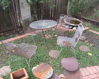 glass-top table and 4 chairs