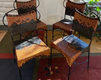 Wicker and black metal dining chairs