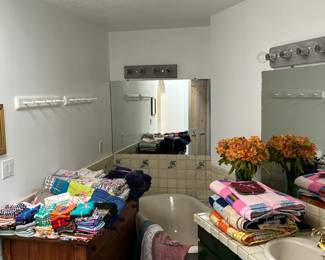 Colorful palette of towels, bedding, quilts, throws, napkins, and more