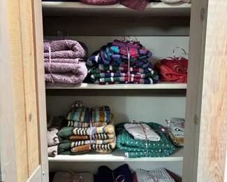 Colorful palette of towels, bedding, quilts, throws, napkins, and more