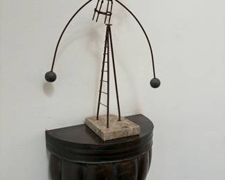 MCM kinetic sculpture balancing act