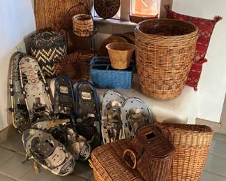 Assorted collection of baskets, snowshoes