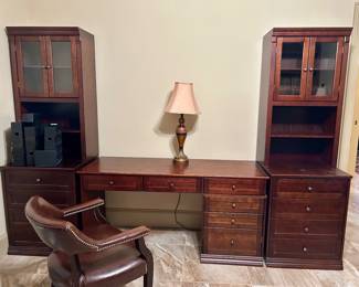 3-Piece executive office suite (pieces can be sold separately), side.  Also shown is a captain’s-style stationary desk chair.