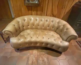 Vintage curved Chesterfield leather sofa