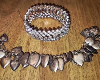 Costume jewelry and sterling.  WW ll sterling bracelet and Kramer costume bracelet 