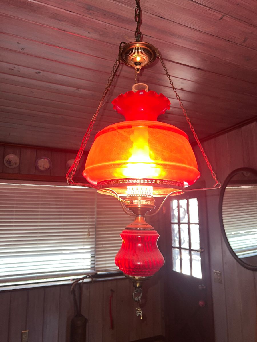 Vintage red glass hanging hurricane lamp, electrified.  $200