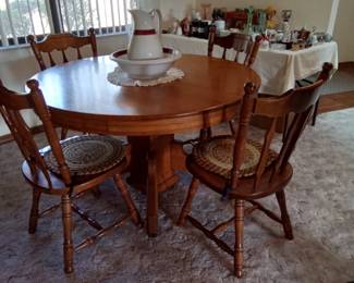 Oak pedestal table, 6 maple chairs available