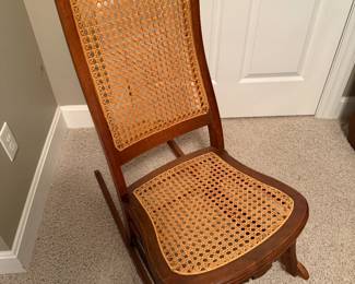 CANE-BACK ROCKING CHAIR SIMILAR TO A LINCOLN ROCKER