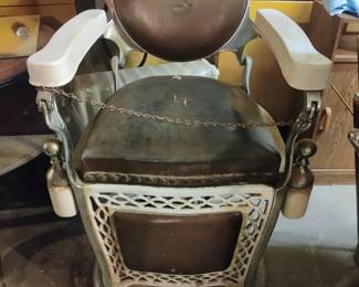 Antique barbering chair 