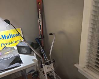 skis, exercise bike