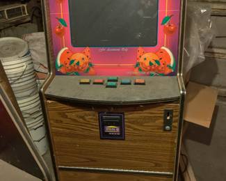 Video gaming machine
Takes money to play
Is in great working condition