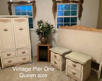Pier, one white wicker bedroom. Nightstands with custom cut glass tops to protect the wicker.